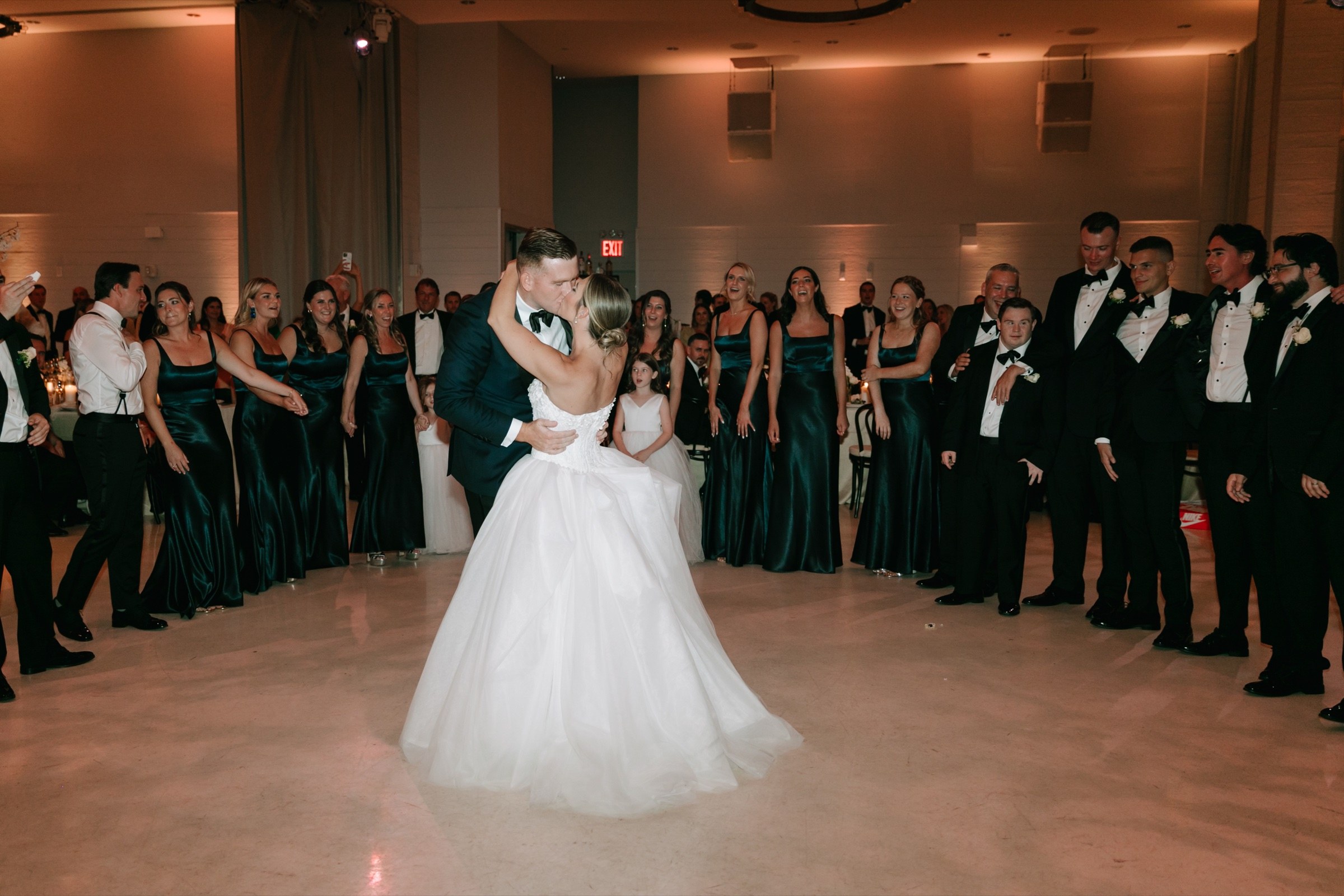 First dance surrounded by the wedding party at the Ravel Hotel